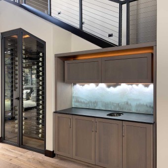 Wide view of the Three Sisters Peaks etched glass backsplash